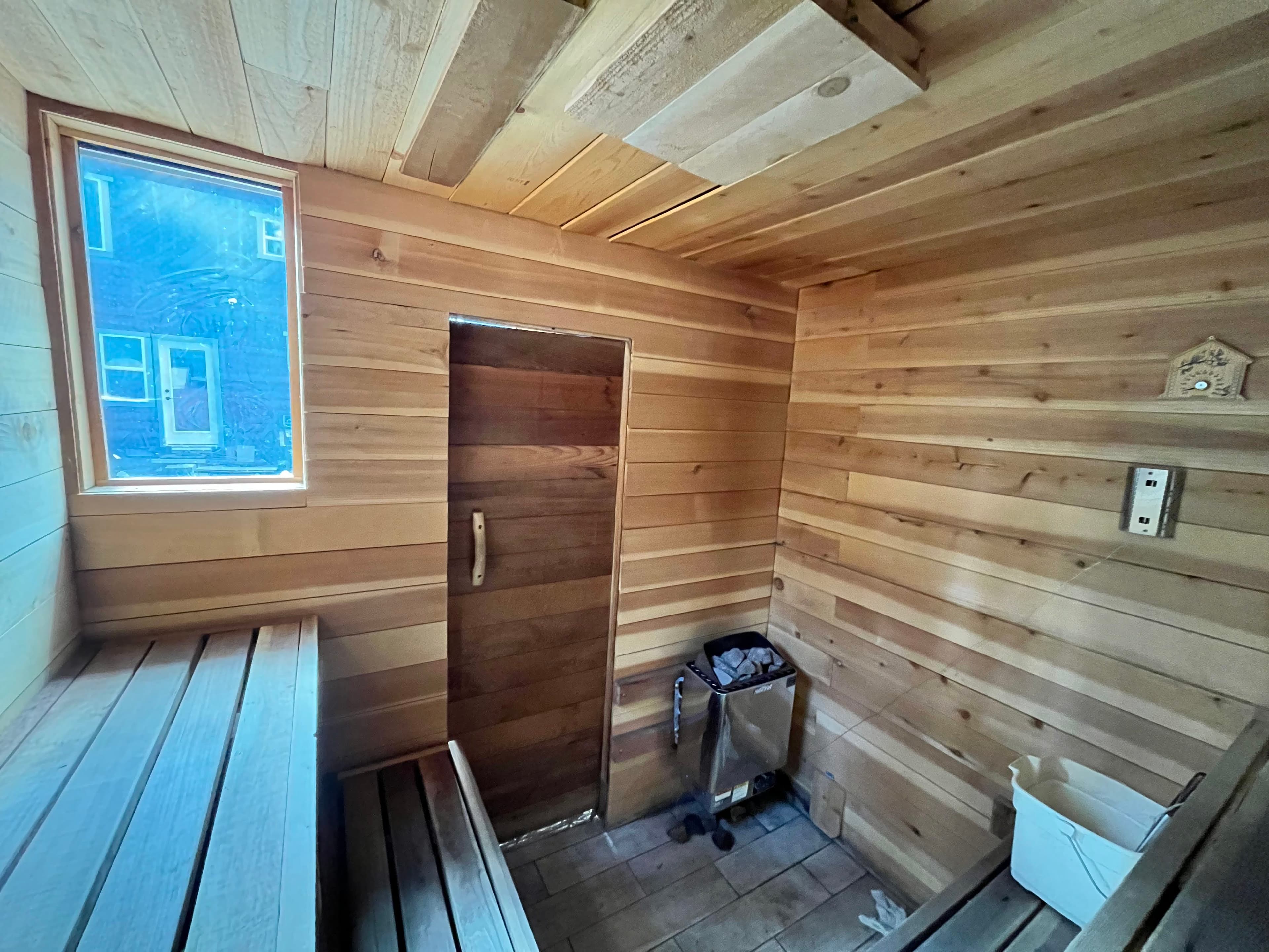 Harvia KIP 80 heater and tile flooring detail – Fountain Ave sauna