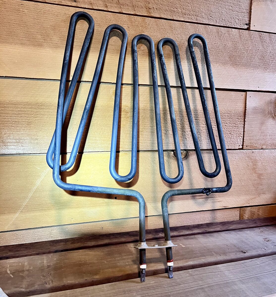 The burned-out heating element removed from the heater